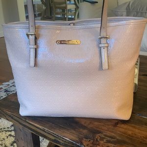 Tan Michael Kors Purse.